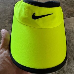 Nike Dri-FIT Ace Visor in a neon yellow/volt color with black trim. 
Running